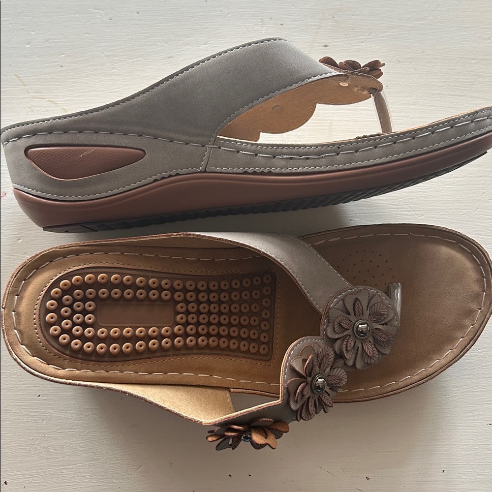 Wedge thong sandals tan designed with flower detailing and massage footbed 8/39